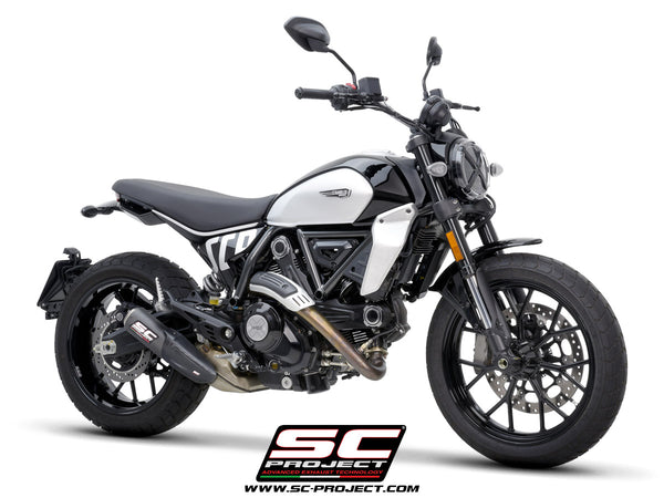 Picture of CR-T carbon fibre exhaust, with stoneguard grid
