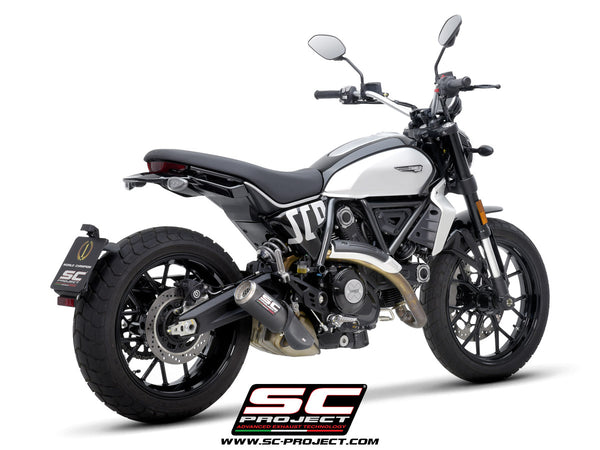 Picture of CR-T carbon fibre exhaust, with stoneguard grid
