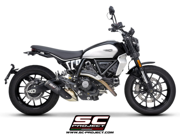 Picture of CR-T carbon fibre exhaust, with stoneguard grid