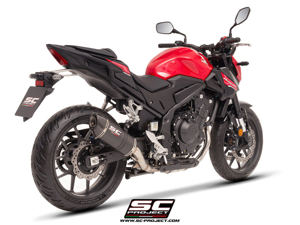 Honda CB500 Hornet with SC-Project Oval carbon exhaust, 3/4 rear view