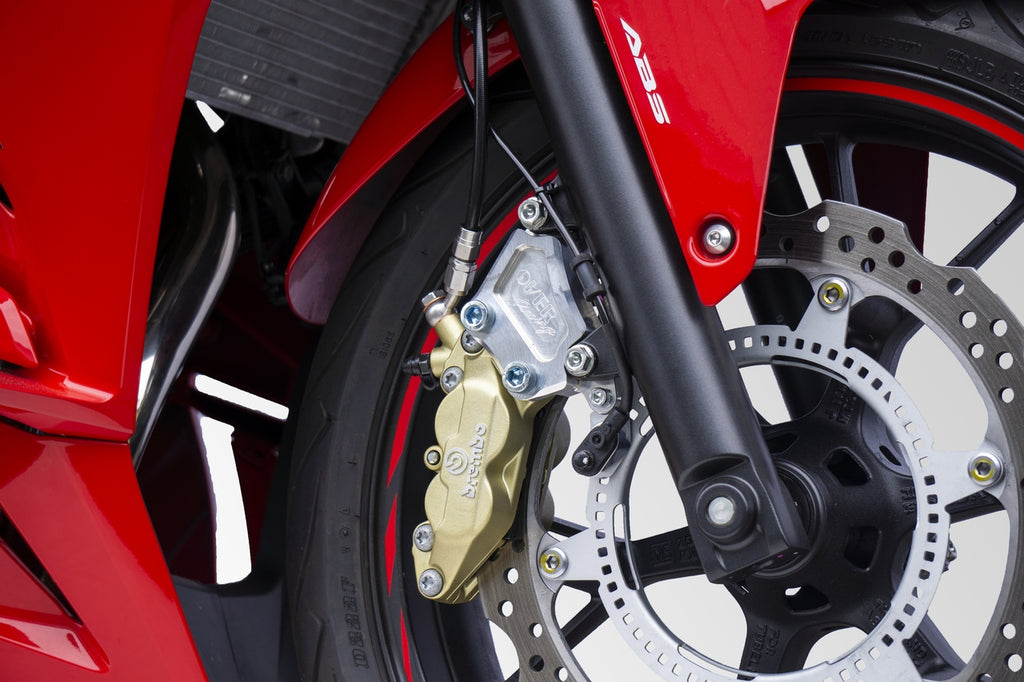 OVER Racing Front Caliper Bracket Brembo 4-Piston for Black CBR400R(16-18)(19-) | 83-102-11B image 1
