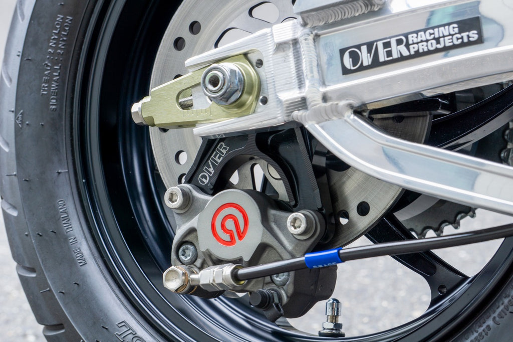 OVER Racing Rear Caliper Bracket Brembo 2-Piston (Crab) DOWN Black DAX125(22-23)(24-) | 83-123-21B image 1
