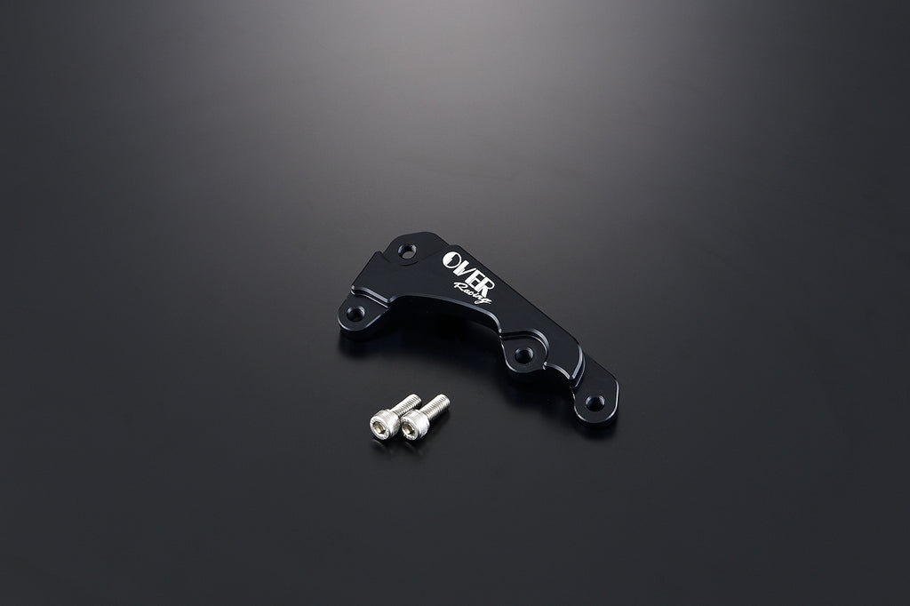OVER Racing Front Caliper Bracket Brembo 2-Piston for Black Cross Cub 110(22-) | 83-125-12B image 1