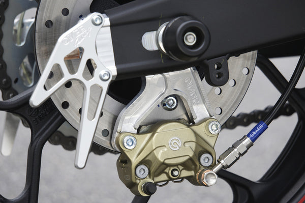 OVER Racing Rear Caliper Bracket for Brembo 2-Piston Caliper Silver YZF-R25 | 83-35-21 image 1