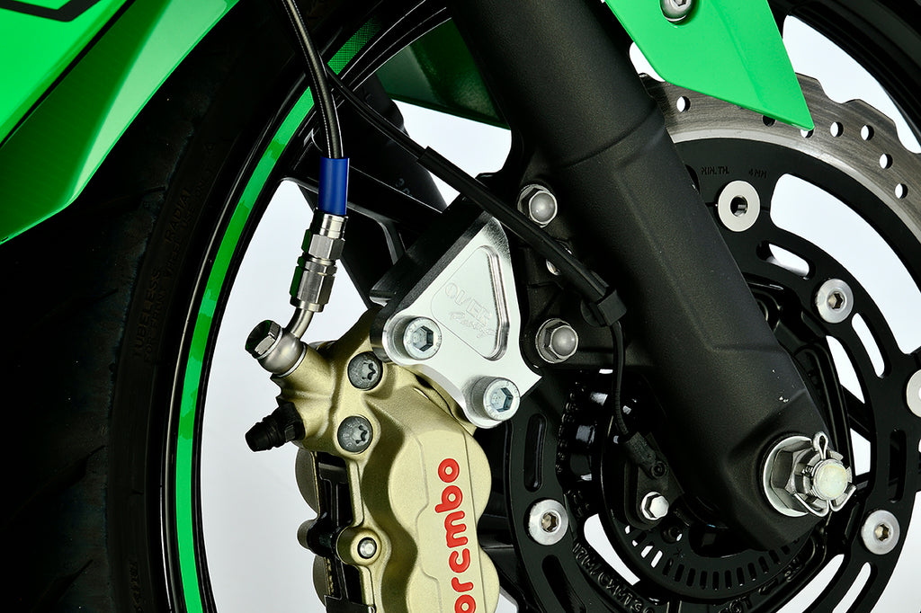 OVER Racing Front Caliper Bracket for Brembo 4-Piston Caliper Silver Ninja400(23-) | 83-723-11 image 1