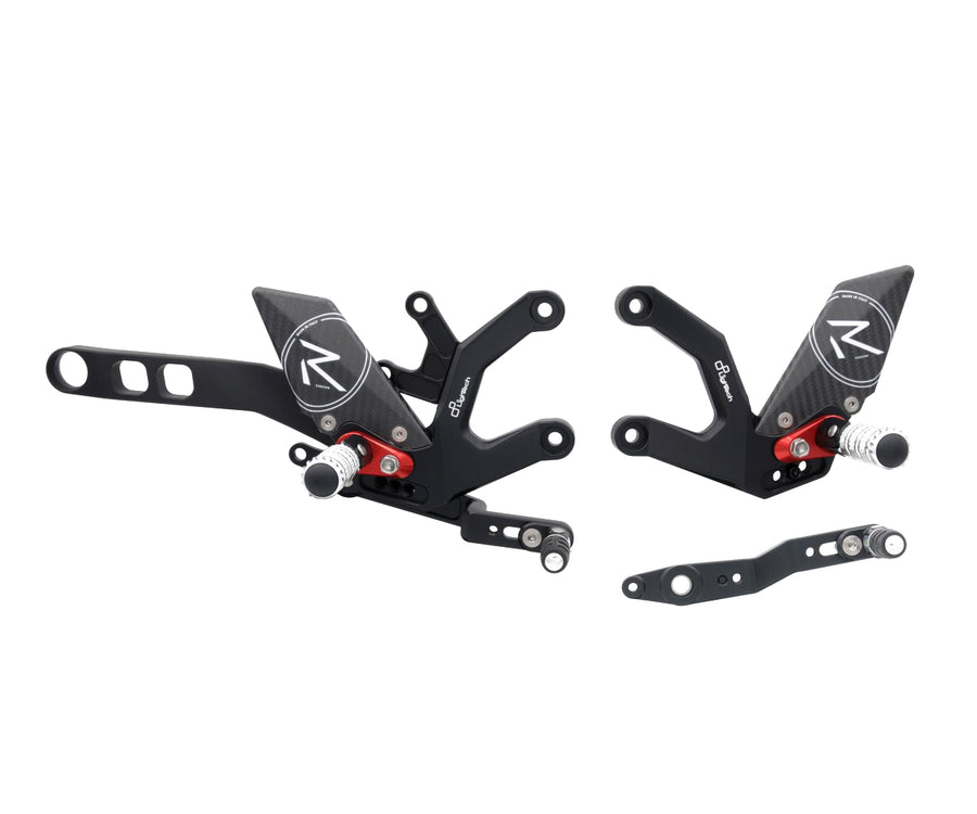LIGHTECH FTRYA011R - R-version paired rearset assemblies with folding footpegs, carbon heel guards and separate brake lever; all fitting hardware is not pictured