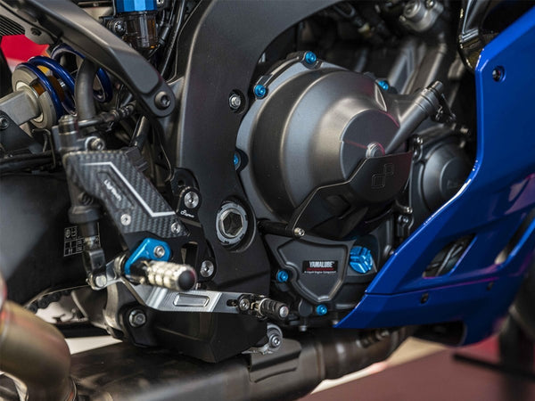LighTech FTRYA023R installed on Yamaha R9; blue optional footpeg holders shown