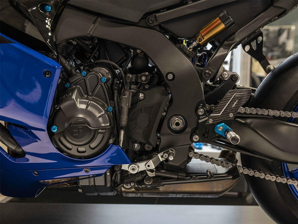 LighTech FTRYA023R installed on Yamaha R9; blue optional footpeg holders shown