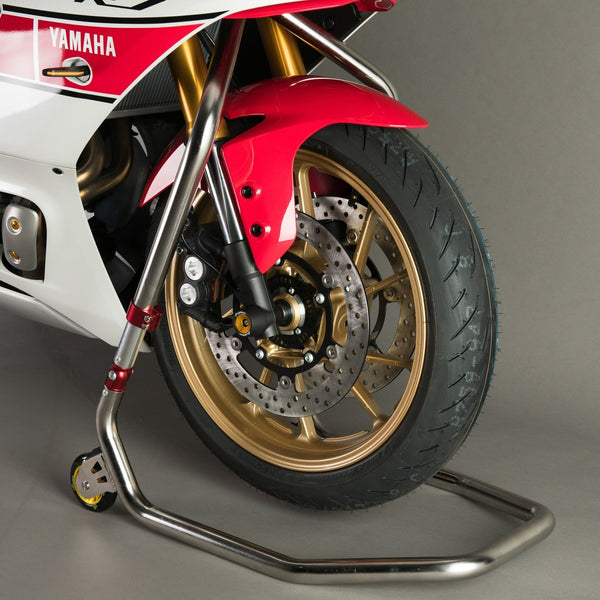 LIGHTECH RSS001 stainless steel front triple-tree stand in use on a motorcycle; required model-specific stem pin sold separately; motorcycle and other accessories not included