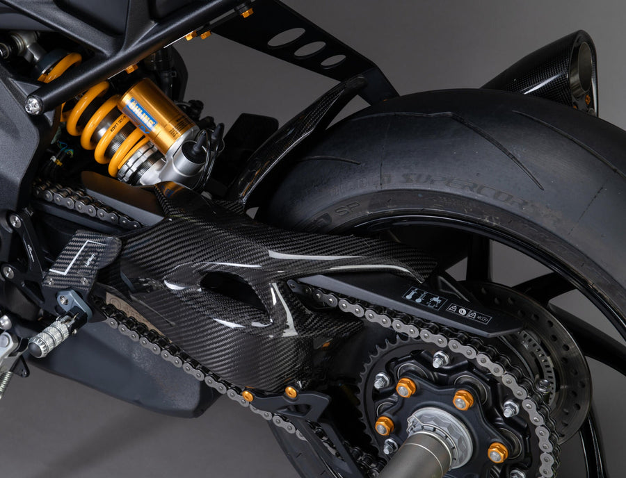 LighTech CART1260 carbon swingarm protectors - pair installed view; other accessories are separate.