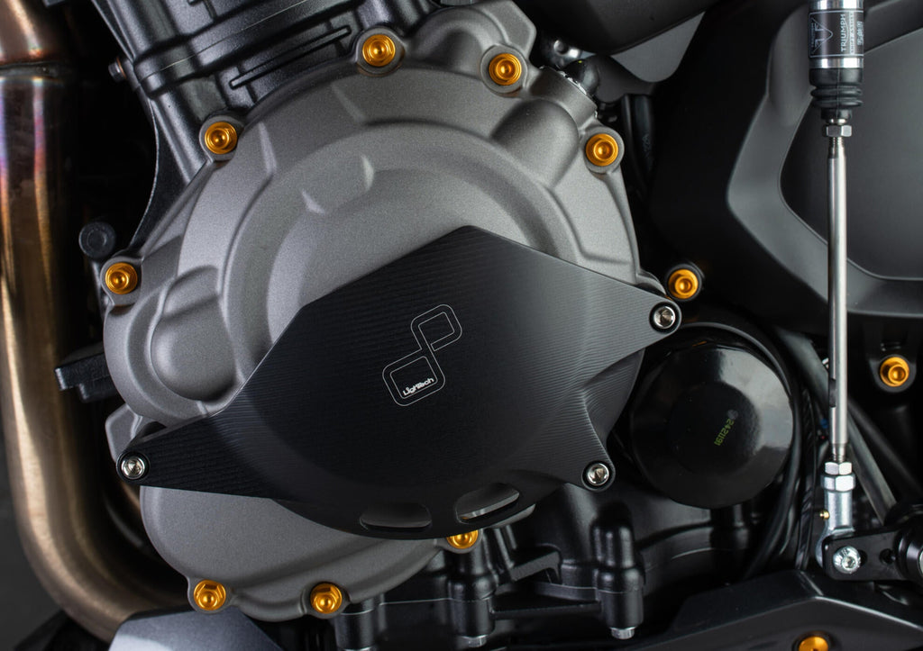 LighTech ECPTR004NER left engine cover protector - black installed view; other accessories are separate.