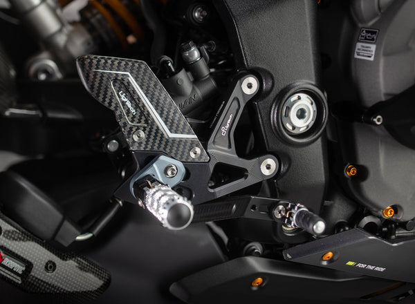 LighTech FTRTR007R r version adjustable rearsets. Installed photograph shows optional grey footpeg holders, which are not included as standard. The motorcycle, exhaust and other accessories are separate.