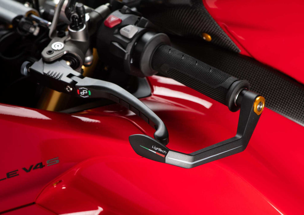 LighTech ISS201LTORO GC-Tech left clutch lever guard, gold, installed example; motorcycle, lever and mounting adapter are separate.
