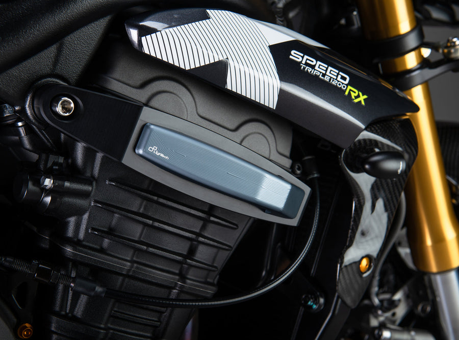 LighTech STETR207GRI frame slider kit - grey. Installed photograph illustrates one side of the set; motorcycle and other accessories are separate.