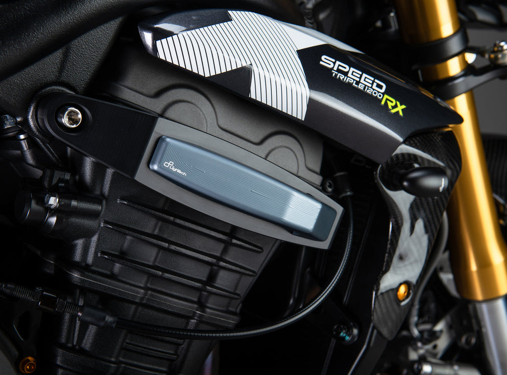 LighTech STETR207GRI frame slider kit - grey. Installed photograph illustrates one side of the set; motorcycle and other accessories are separate.