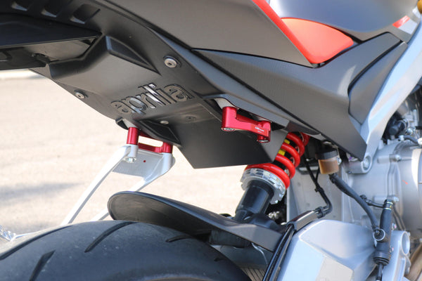 CNC RACING | Rear footrest blanking plates Aprilia