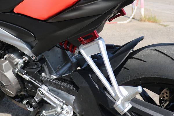 CNC RACING | Rear footrest blanking plates Aprilia