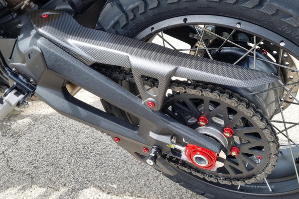 CNC RACING | Chain upper guard Ducati DesertX - Carbon
