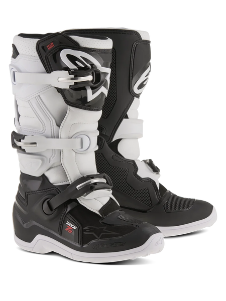 Alpinestars Youth Tech 7S Boots, Motocross Boots, Black and White, featuring adjustable buckle closure system, TPU shin guard and pivot system, durable construction with thick patterned soles for off-road riding