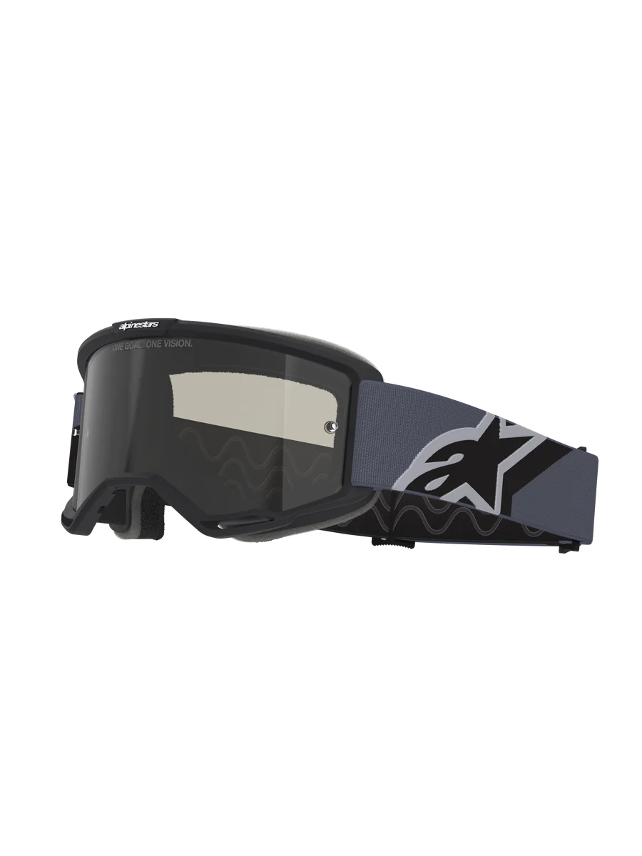 Alpinestars Vision Sand Goggles, Motocross Goggles, Black and Gray frame with Dark Smoke lens, wide blue-gray strap featuring a large black and white Alpinestars logo, protective eyewear for off-road and desert riding