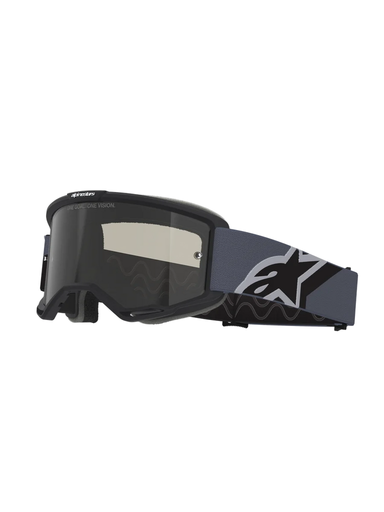 Alpinestars Vision Sand Goggles, Motocross Goggles, Black and Gray frame with Dark Smoke lens, wide blue-gray strap featuring a large black and white Alpinestars logo, protective eyewear for off-road and desert riding