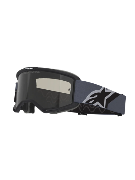 Alpinestars Vision Sand Goggles, Motocross Goggles, Black and Gray frame with Dark Smoke lens, wide blue-gray strap featuring a large black and white Alpinestars logo, protective eyewear for off-road and desert riding