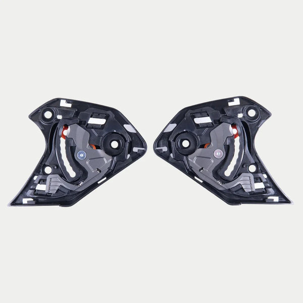 Alpinestars Supertech R10 Shield Mechanism, Helmet Accessory, Black, pair of replacement visor mechanisms for S-R10 helmets, intricate black plastic components with visible metal and orange mechanical parts, essential hardware for helmet shield operation.