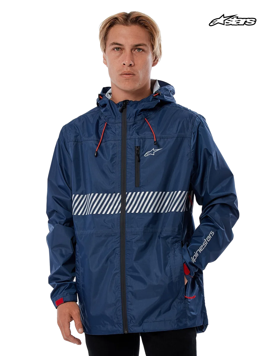 Alpinestars Fusion Rain Jacket, waterproof hard-shell rain jacket in navy, worn by a model, featuring a fixed hood with bungee adjusters, white chest graphic, and reflective details.