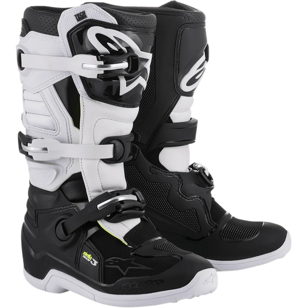 Alpinestars Women Stella Tech 3 Boots, Motocross Off-Road Boots, Black and White, featuring a three-buckle closure system, white TPU shin plates with Alpinestars branding, black microfiber upper with white panels, white soles, protective performance footwear for female riders