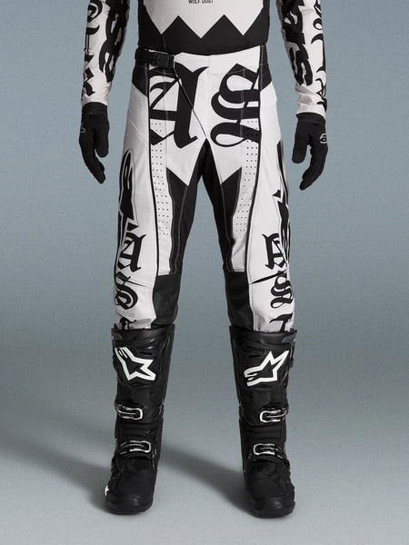 Alpinestars Limited Edition Techstar Wolf Dust Pants and Gear Set, black and white motocross gear for off-road performance.