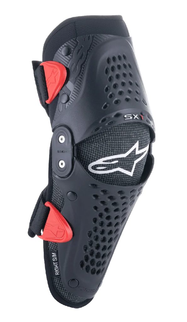 Alpinestars Youth SX-1 Knee Protectors, Motocross Knee Guards, Black and Red, featuring perforated ventilation holes, dual-pivot hinge system, adjustable straps with red buckles, white star logo, youth off-road motorcycle protection