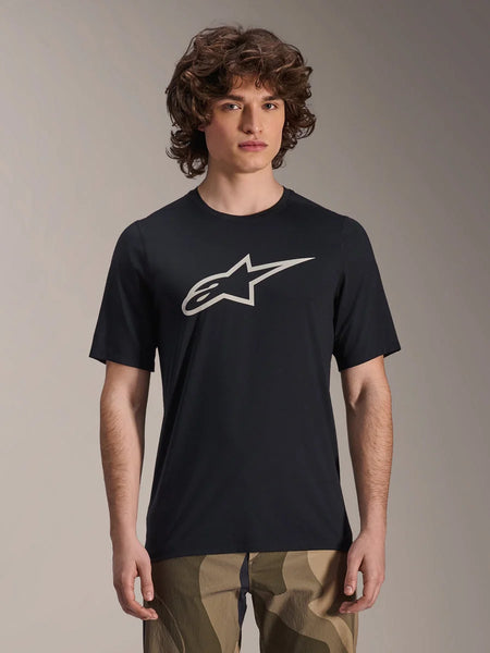 Alpinestars A-Dura Astar Jersey, Short Sleeve MTB Jersey, Black with white star logo, worn with camouflage pants, casual mountain biking apparel, technical moisture-wicking fabric