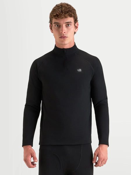 Alpinestars AT-8 Merino Top Layer, men's adventure motorcycle base layer in black, front view worn by a model showcasing long sleeves, mock neck with half-zip, and dual-layer Merino wool thermal construction.