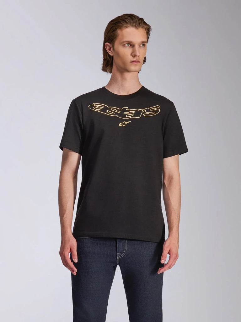 Alpinestars Luxo CSF Tee, Short Sleeve T-Shirt, Black, Gold Outlined Astars Logo on Chest, worn with dark blue jeans, Casual Motorsport Streetwear