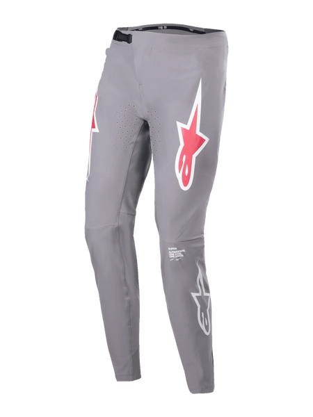 Alpinestars A-Supra Race Pants, MTB Racing Pants, Dark Gray, featuring red and white star logos on the thighs, laser-perforated ventilation holes, black ratchet waist closure, slim performance fit for mountain biking