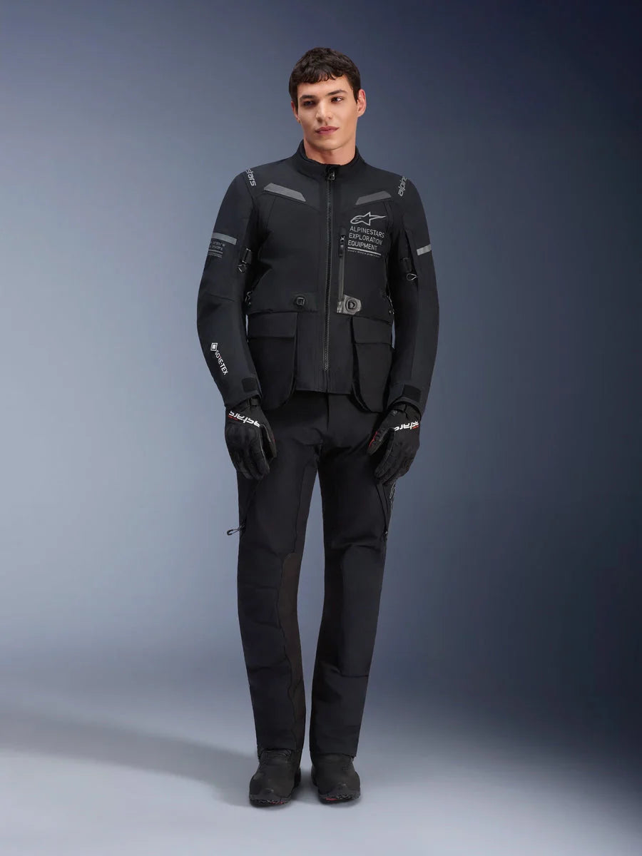 Alpinestars ST-7 2L GORE-TEX Pants, Black Motorcycle Touring Pants, Waterproof and Breathable, Full-body view worn with matching jacket, Premium technical construction for adventure riding