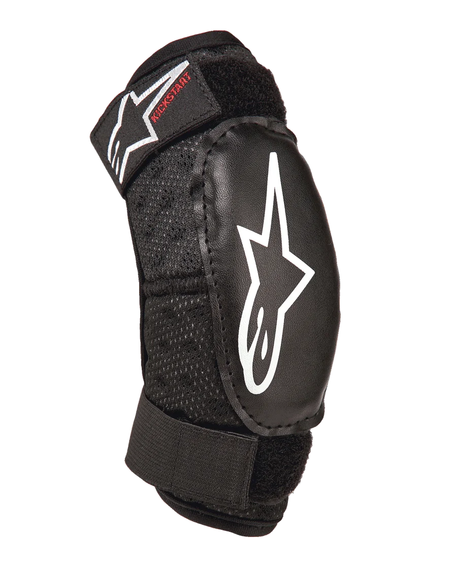 Alpinestars Youth Bionic Action Kickstart Elbow Guard, Black, protective youth elbow pad with white star logo and red Kickstart branding, double adjustable straps with Velcro, breathable mesh fabric, ergonomic design for motocross and action sports
