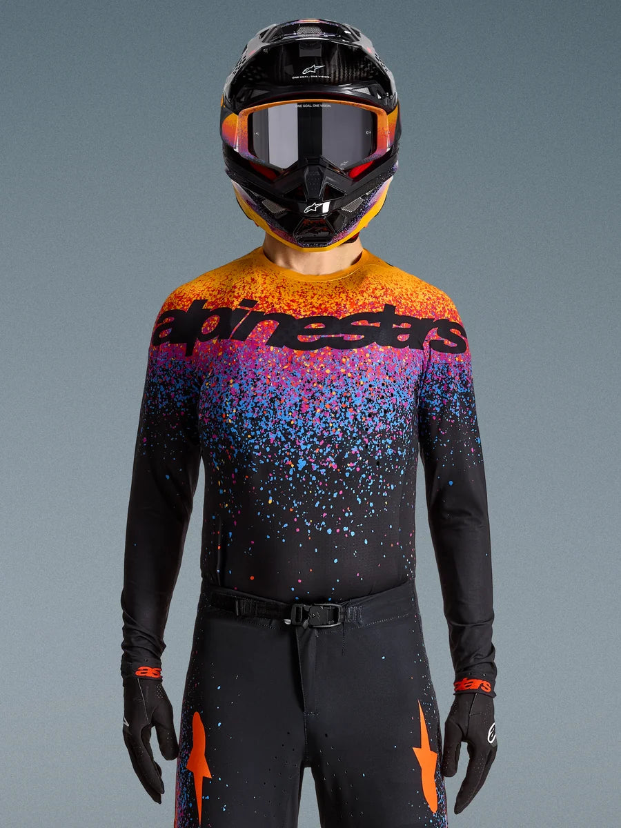 Alpinestars Limited Edition Supertech Black Hole Jersey, motocross racing jersey in black with vibrant orange and purple bursts.