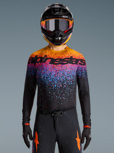 Alpinestars Limited Edition Supertech Black Hole Jersey, motocross racing jersey in black with vibrant orange and purple bursts.
