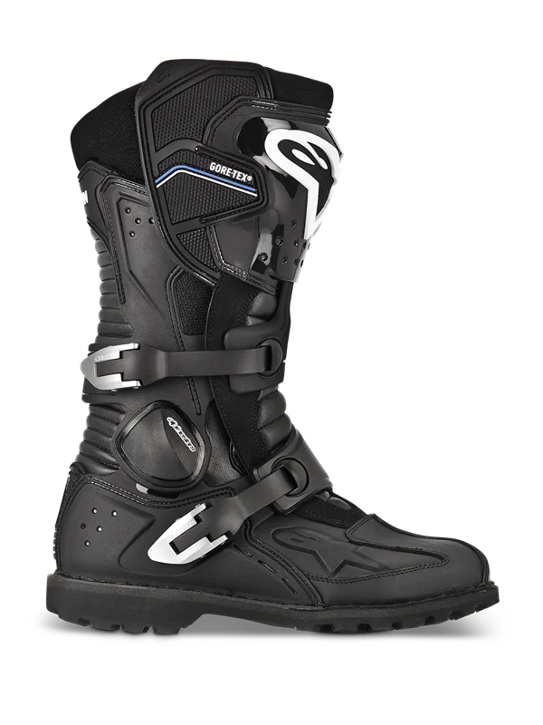 Alpinestars Toucan GORE-TEX Boots, Adventure Touring Motorcycle Boots, Black, profile view featuring dual silver aluminum buckles, GORE-TEX branding, reinforced shin guard with white logo, and rugged lugged sole