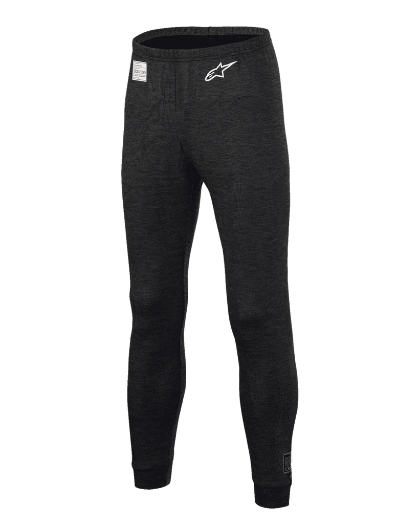 Alpinestars Race V3 Bottom, Auto Racing Base Layer Pants, Black, featuring flame-resistant textured fabric, white star logo on the thigh, FIA certification label on the waistband, full-length technical undergarment for professional motorsport