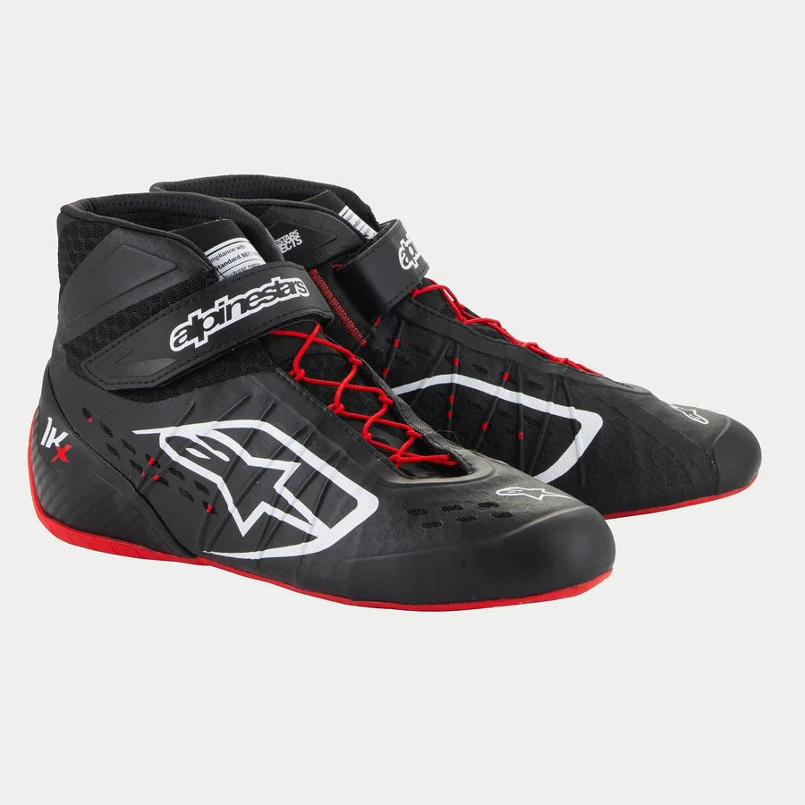 Alpinestars Tech-1 KX V3 Shoes, Karting Shoes, Black White and Red, featuring white Alpinestars logos, red asymmetric laces, and a red outer sole, sleek thermo-welded construction with laser-cut perforations and adjustable ankle straps for motorsport performance.