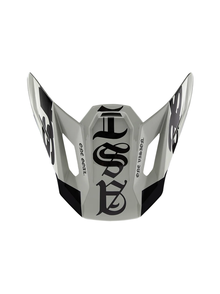 Alpinestars Limited Edition S-M7 Wolf Dust Visor 22.06, Motocross Helmet Replacement Peak, Dune and Black Glossy, featuring gothic-style graphics and 'ONE GOAL' 'ONE VISION' text, aerodynamic design for off-road racing