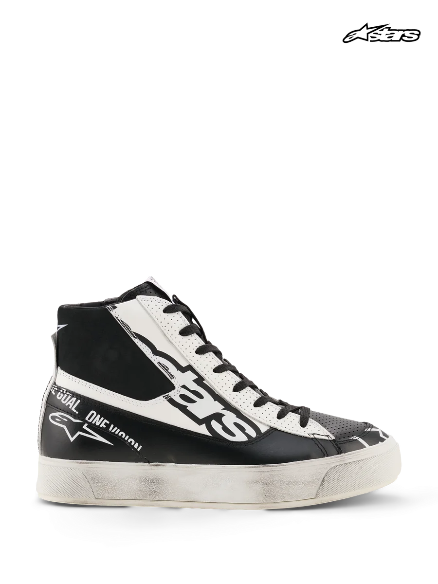 Alpinestars Stella Stated Flair Shoes, women's urban motorcycle riding shoes in black and white, high-top silhouette with TPF ankle protection and CE certification, side profile view showing hand-applied worn finish and vulcanized rubber sole