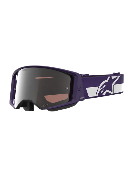 Alpinestars Limited Edition HUNTA96 XXV Supertech Vision Goggles, Motocross Goggles, Purple and White with Silver Mirror Lens, featuring "ONE GOAL. ONE VISION." text on the lens, wide adjustable strap with prominent Alpinestars logo, high-performance protective eyewear for off-road racing