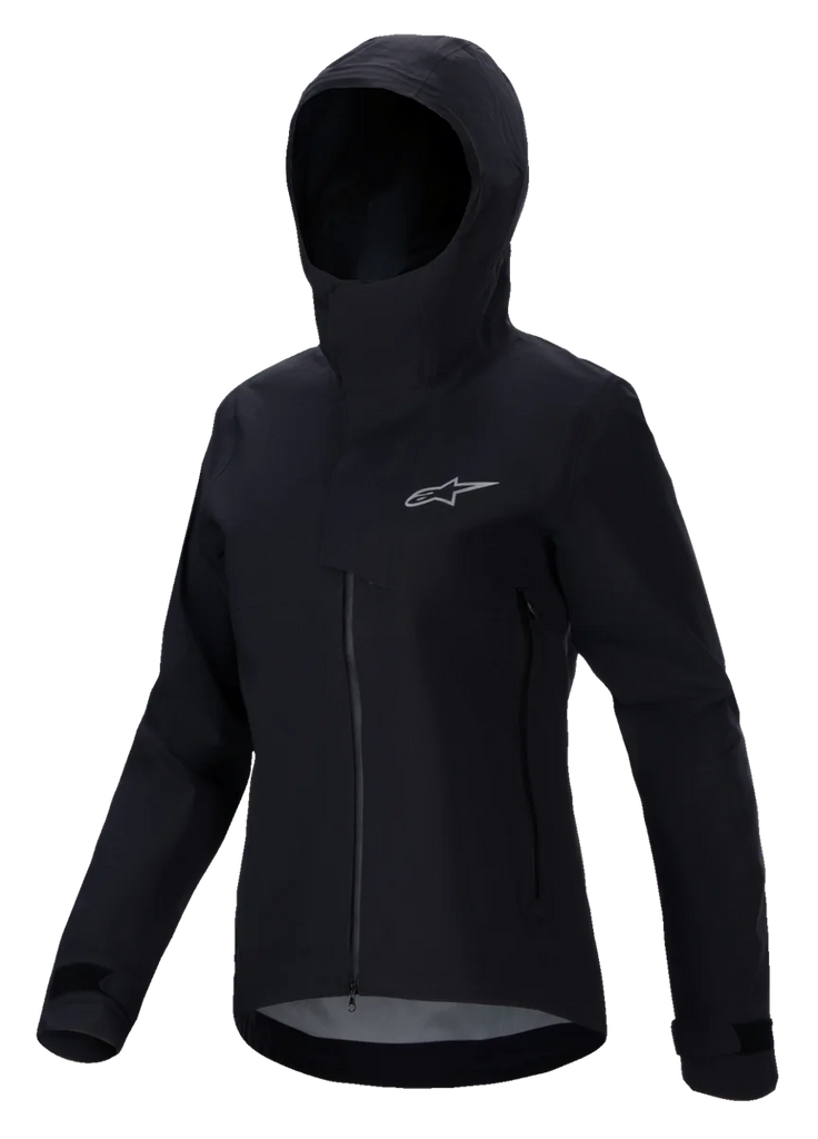 Alpinestars Stella A-Dura Elite Waterproof Jacket, Women's Mountain Bike Jacket, Black, featuring a hooded design with a protective storm flap, front zipper, zippered hand pockets, and adjustable velcro cuffs, technical waterproof fabric with a silver logo on the chest