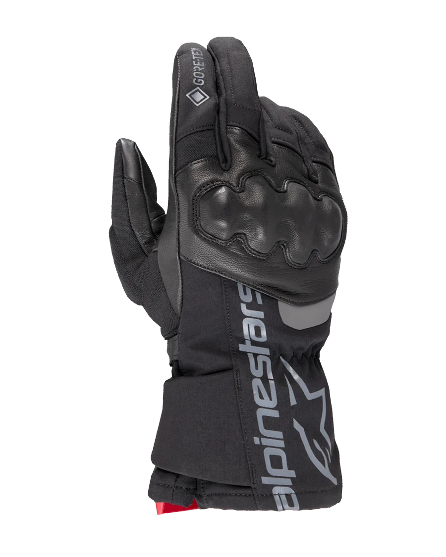 Alpinestars WT-4 Gore-Tex Insulated Glove, Black Motorcycle Glove, Hard Knuckle Protection, Leather and Textile Construction, GORE-TEX Waterproof Technology, Silver Alpinestars Logo and Wordmark on Cuff, Red Accent at Wrist, Winter Riding Glove