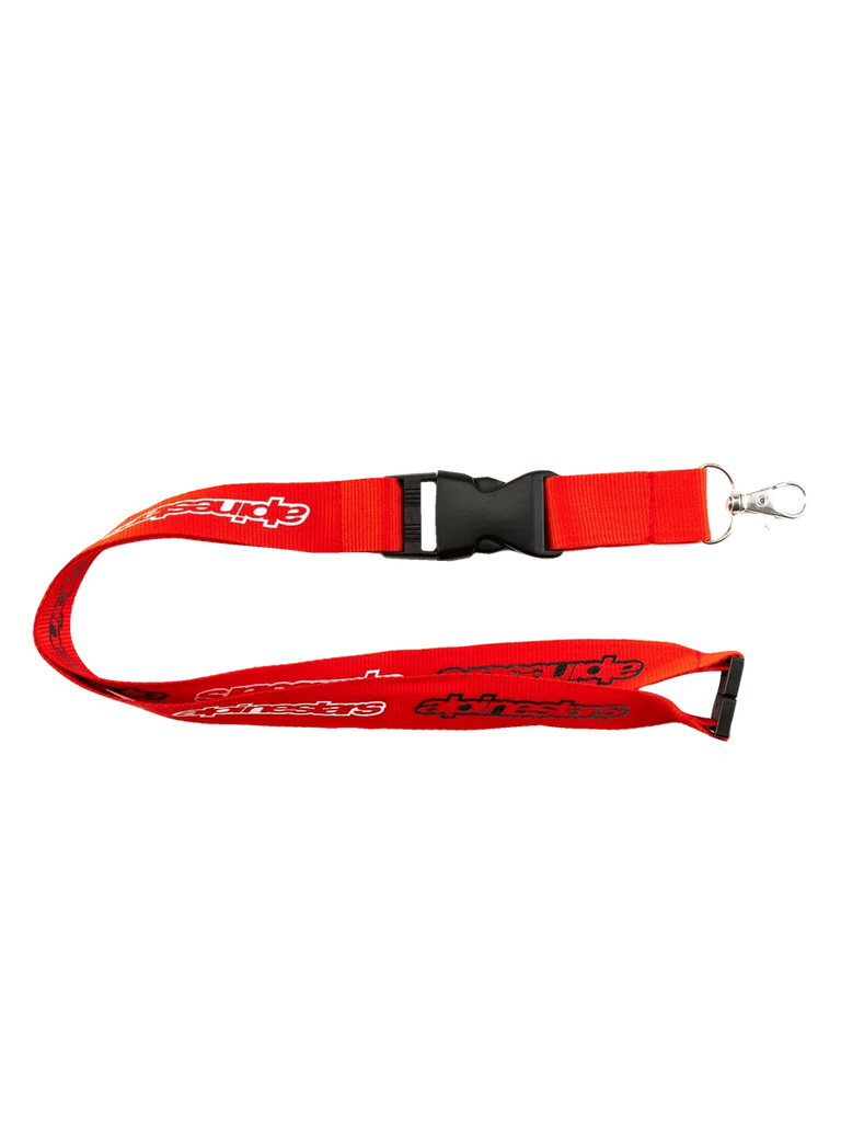 Alpinestars Core Lanyard, Red sportswear lanyard, 100% polyester with printed white branding logos, black plastic breakaway safety clip, and a detachable metal swivel clip