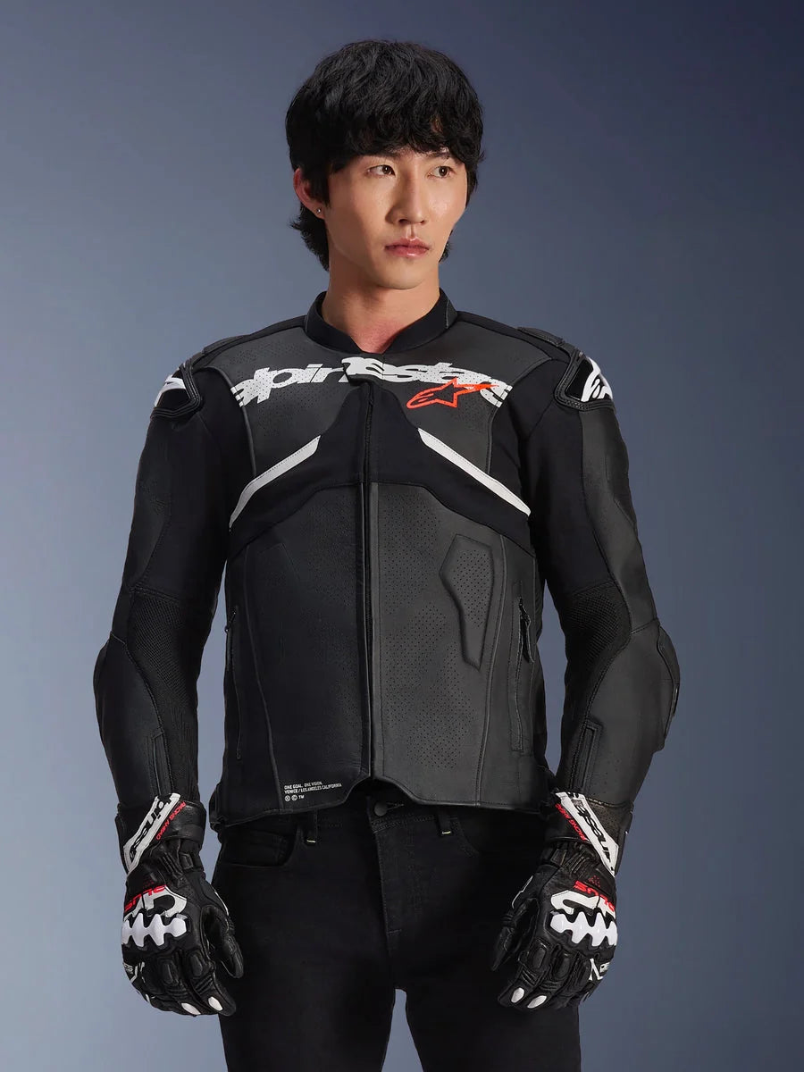 Alpinestars Atem V5 Leather Jacket, Motorcycle Racing Jacket, Black with White and Red Accents, premium leather construction with armored protection, worn with matching racing gloves