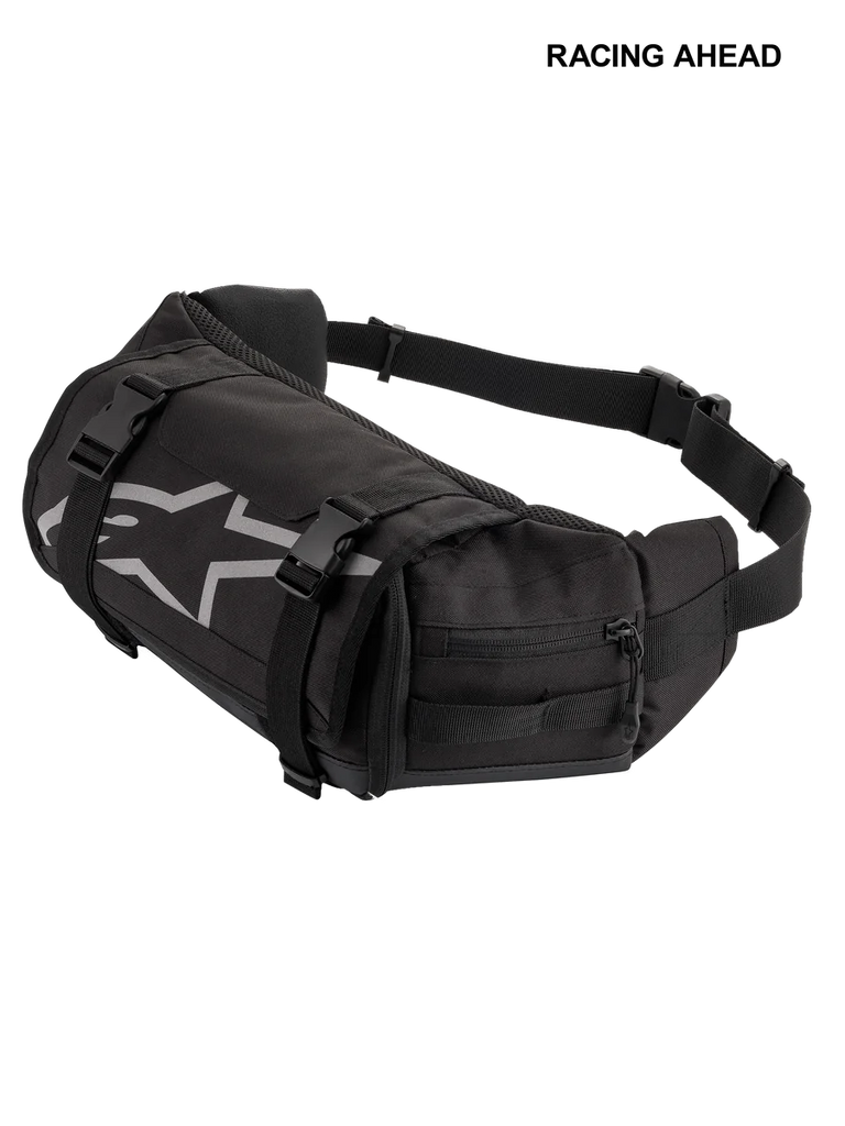 Alpinestars Tech Tool Pack, Black, durable motorcycle tool waist bag, featuring grey Alpinestars star logo, adjustable compression straps with plastic buckles, and zippered side compartments for enduro and off-road use
